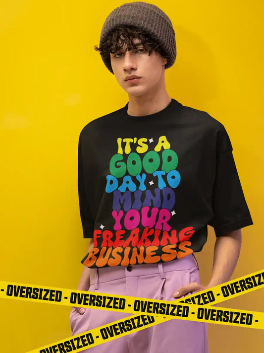 Man wearing Good day to Mind your Freaking Business- Black Oversized T-Shirt 