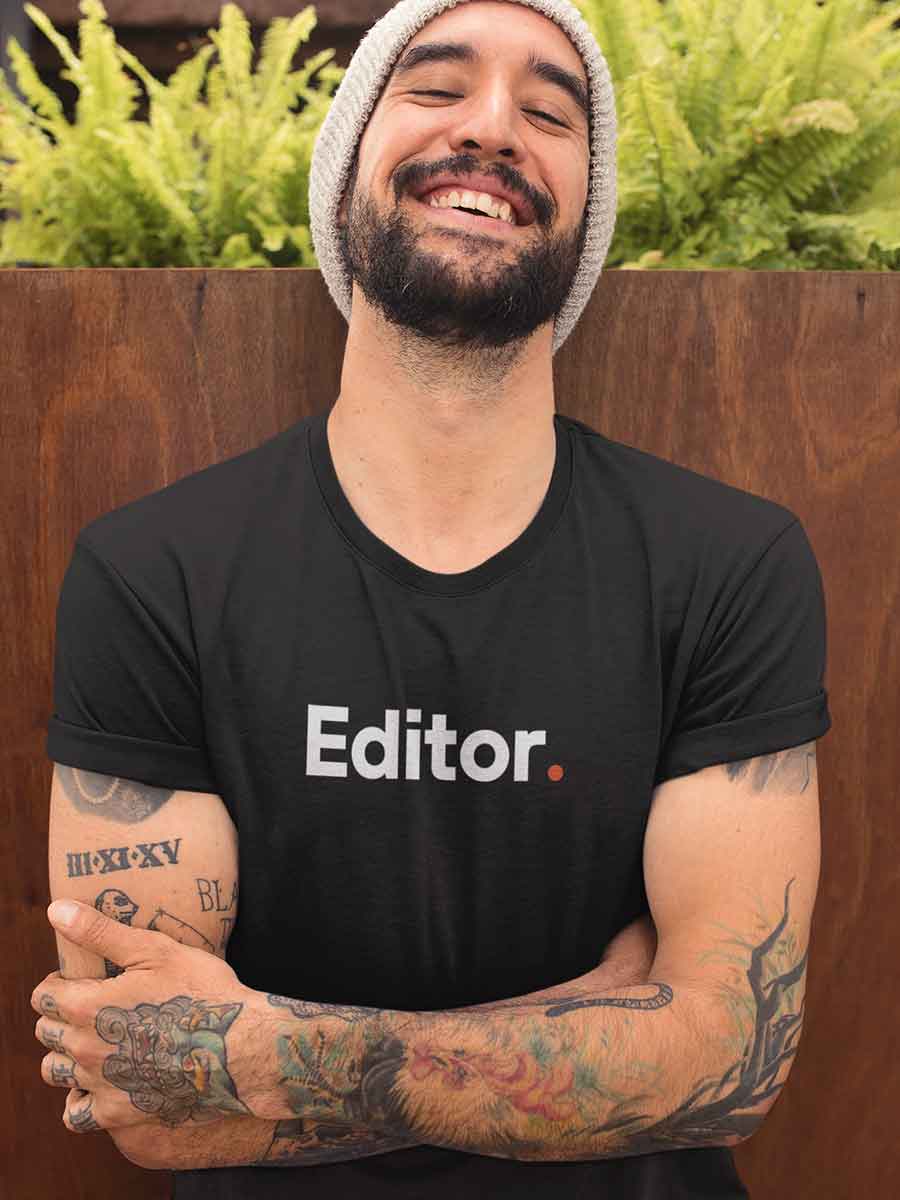Man wearing Editor - Minimalist Black Cotton T-Shirt
